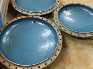 Pites preenchidos e cabeçotes revestidos com material Belzona Pites preenchidos e cabeçotes revestidos com material Belzona